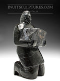 9" Carver Carrying Soapstone by Pits Qimirpik